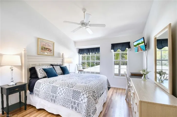 Bedroom featuring light wood finished floors and a ceiling fan
