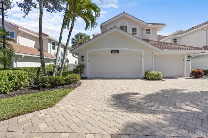 Mediterranean / spanish-style house with stucco siding, decorative driveway, a garage, and a tiled roof