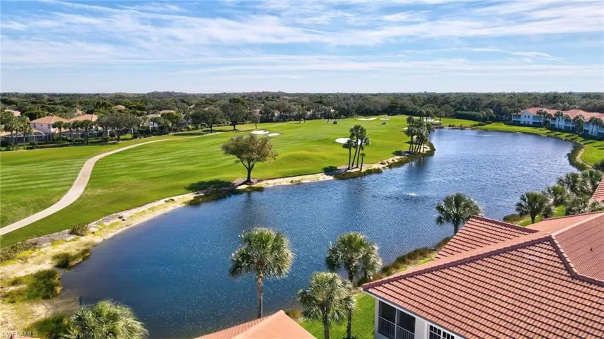 Bird's eye view of a large body of water and a tree filled landscape