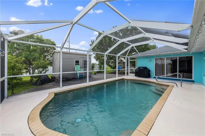 Pool and Shed with Second Living Room Sliders