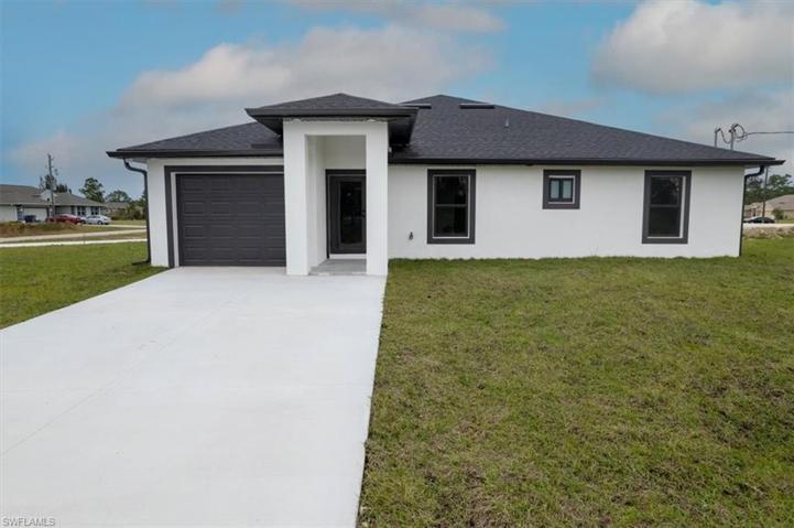 1910  RICHMOND N AVE, LEHIGH ACRES, FL 33972