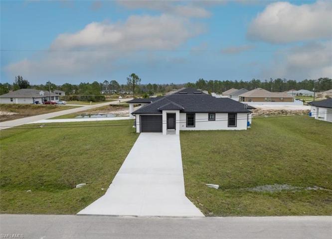 1910  RICHMOND N AVE, LEHIGH ACRES, FL 33972