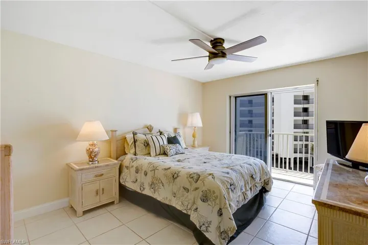 Spacious guest bedroom with adjoining balcony