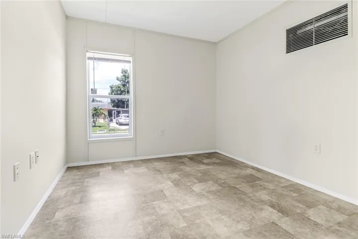 View of tiled empty room