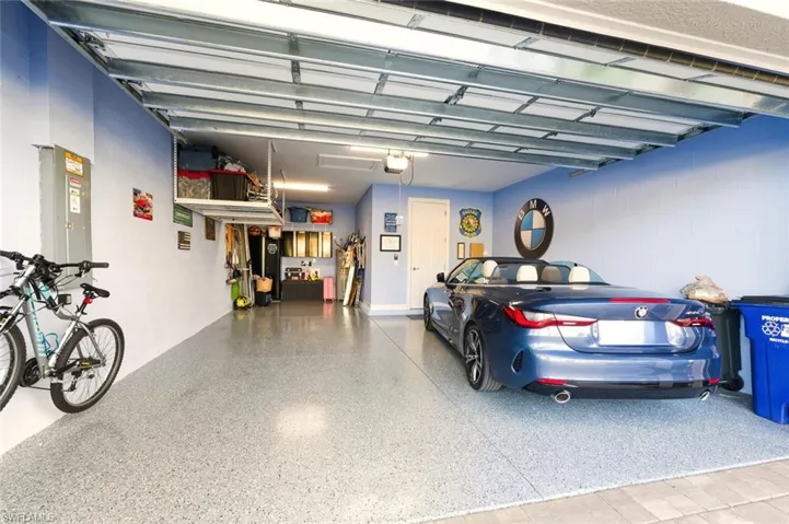 Garage featuring electric panel