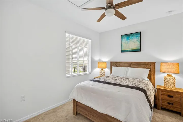 Bedroom featuring carpet floors and a ceiling fan
