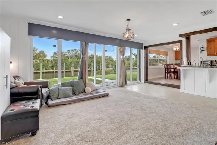 Living room featuring a water view