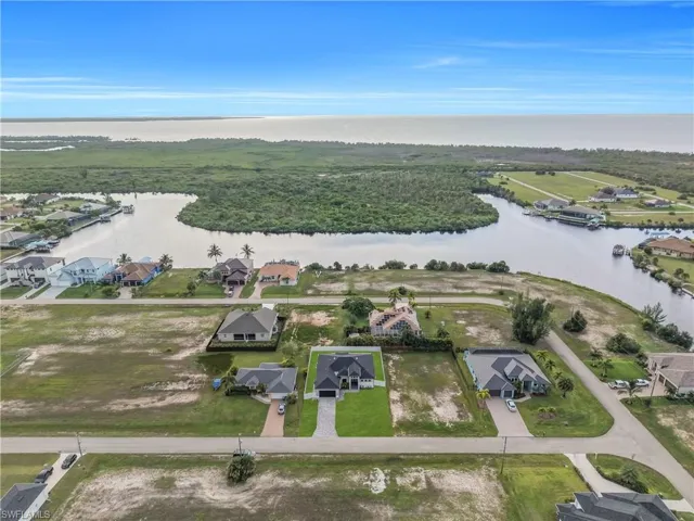 Waterfront property with canal access and direct proximity to open water