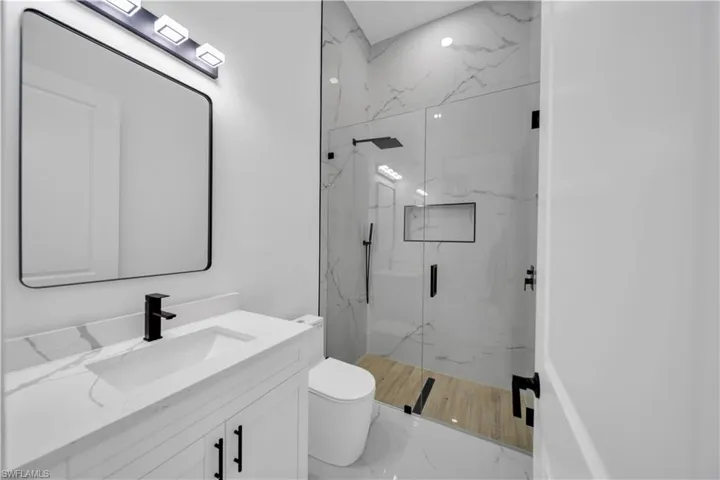 Vanity with integrated sink and quartz countertop