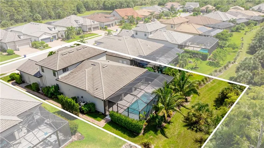 Aerial perspective of suburban area with property parcel outlined