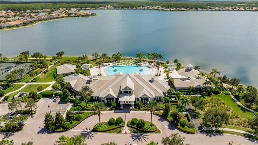 Bird's eye view of a pool and a large body of water