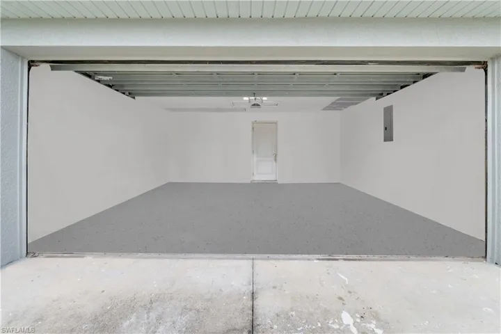 Garage featuring electric panel