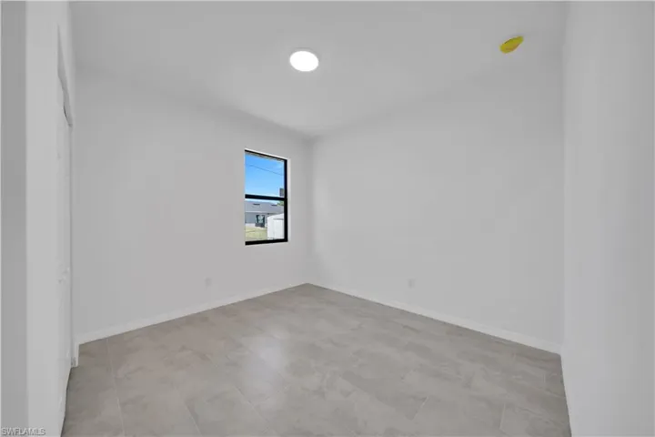 Empty room with baseboards