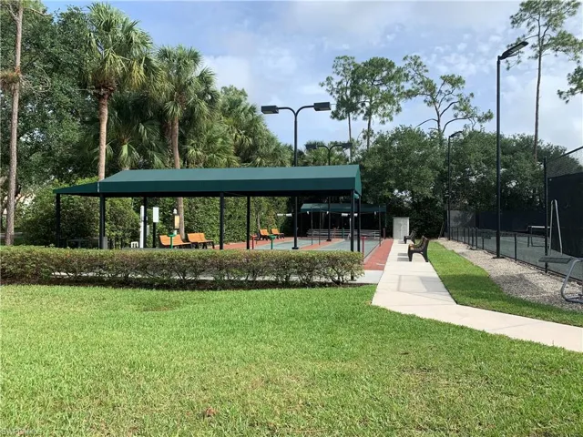 View of home's community featuring a yard