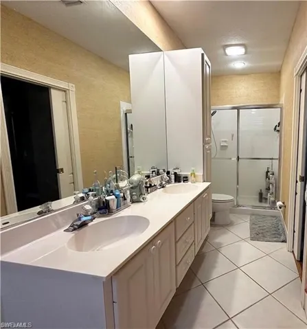 MASTER BATHROOM DOUBLE SINK & SHOWER VIEW