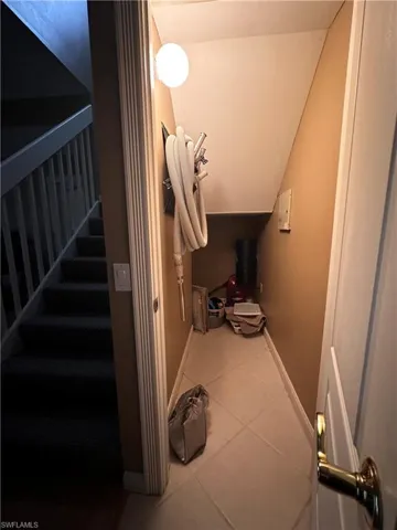 STORAGE / CENTRAL VAC SYSTEM UNDER STAIRS
