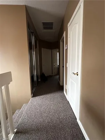 HALLWAY VIEW TOWARDS BEDROOMS 2 & 3