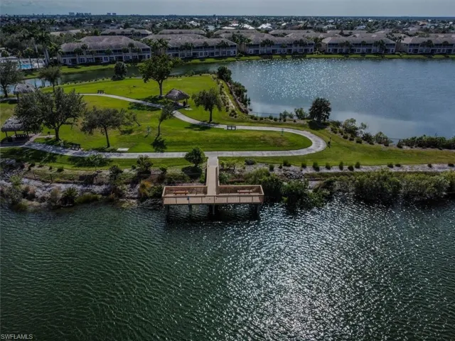 Birds eye view of FISHING PIER with a water view