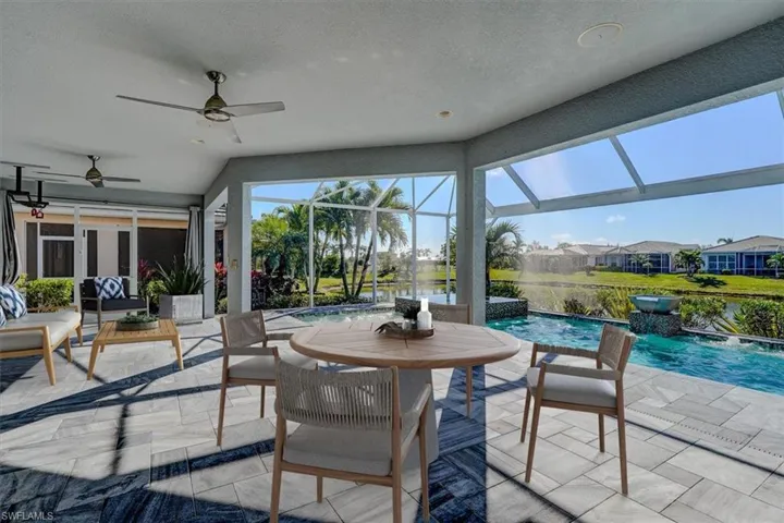 Lanai featuring a saltwater pool and infinity spa