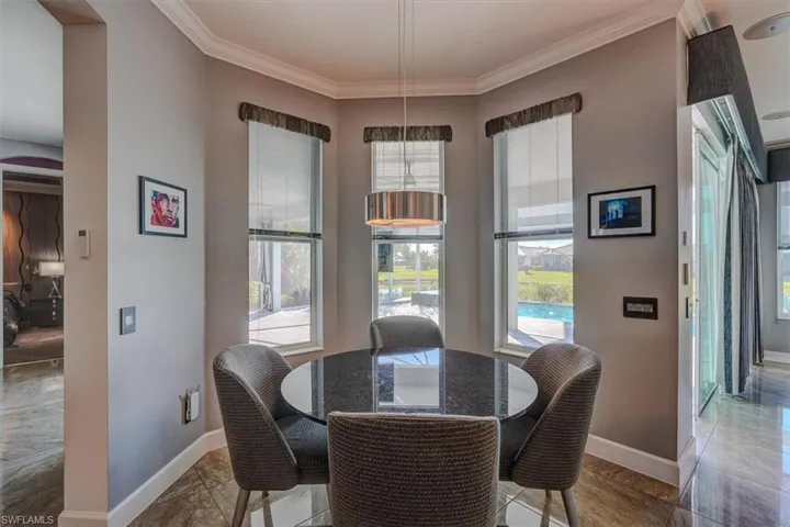 Kitchen Dining space with crown molding
