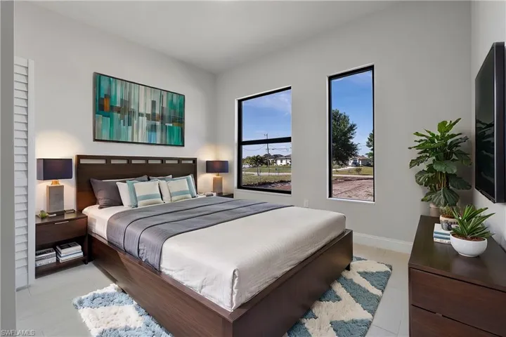 Bedroom featuring baseboards