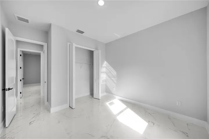 Unfurnished bedroom with a closet