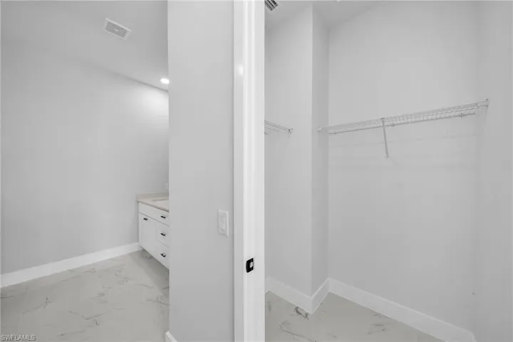 View of walk in closet