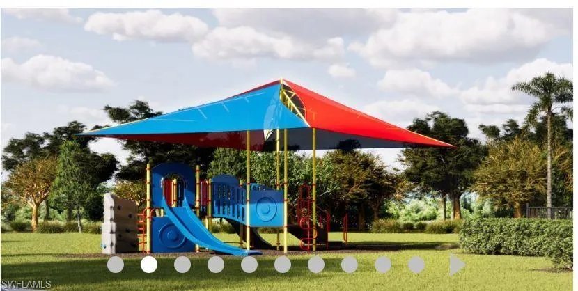 Community jungle gym with a yard