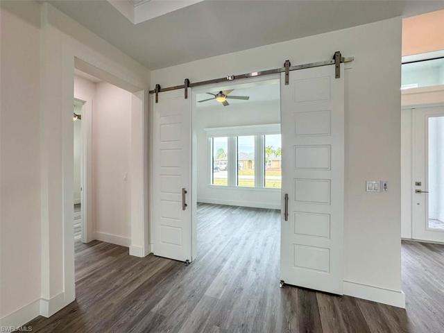 Barn Doors entry that can be used as office or bedroom