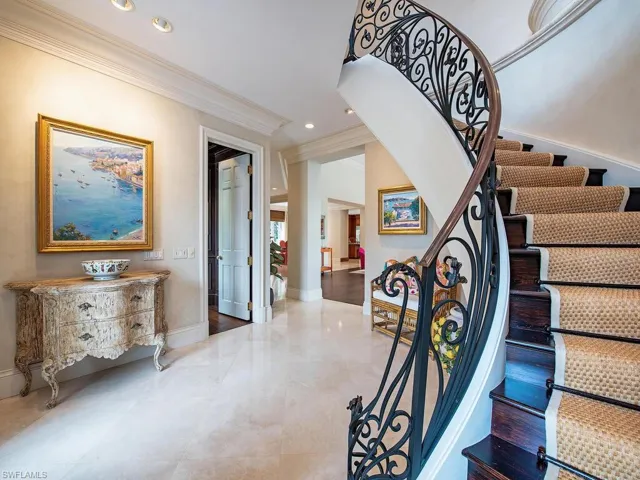 Dramatic entryway and grand staircase