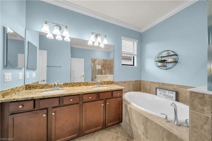 Dual vanity with granite countertop and undermount sinks