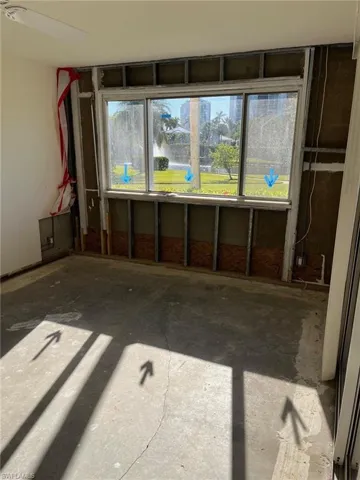 Spare room with ceiling fan