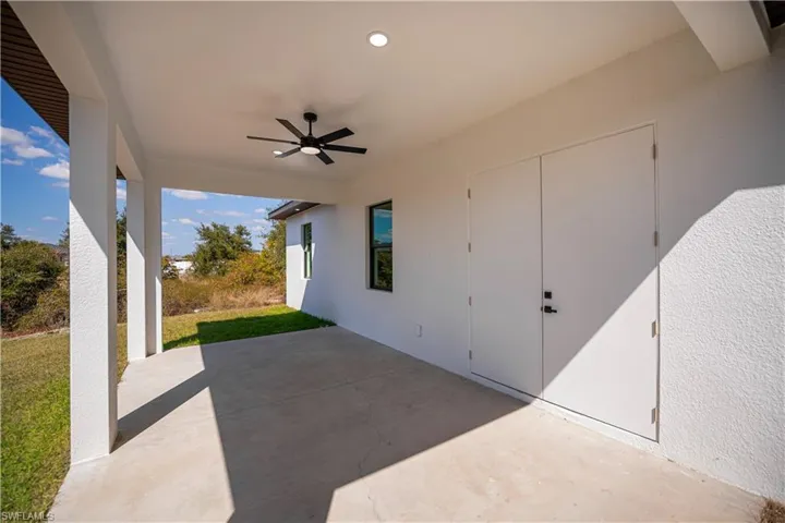 View of patio with a ceiling fan
