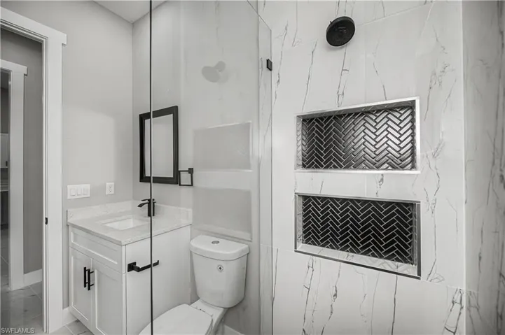 Bathroom with toilet and vanity