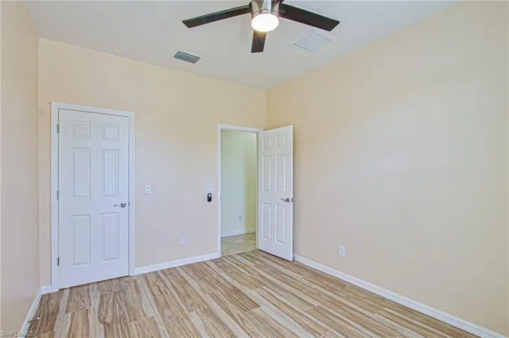 2nd bedroom w/tile flooring
