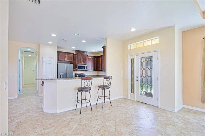 View of Kitchen and Entry to property from Main Living Area
