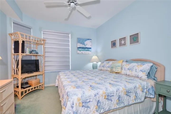 Bedroom featuring carpet flooring and ceiling fan