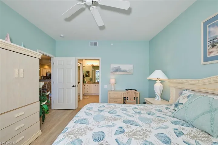 Bedroom featuring ceiling fan and light hardwood / wood-style floors