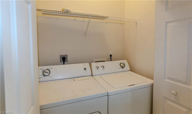Laundry room featuring washer and dryer