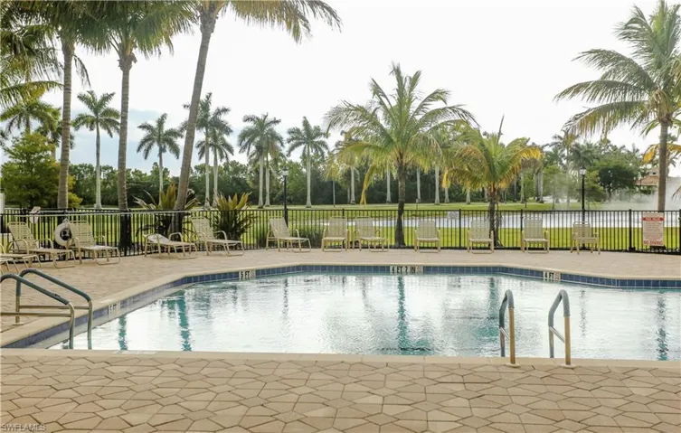 Community pool with a patio area