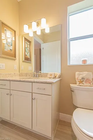Bathroom featuring toilet and vanity