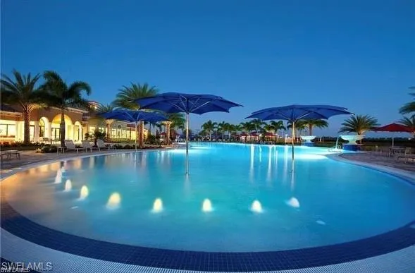 View of pool at twilight
