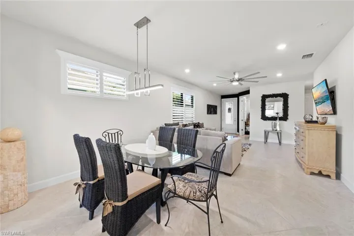 Dining space featuring ceiling fan