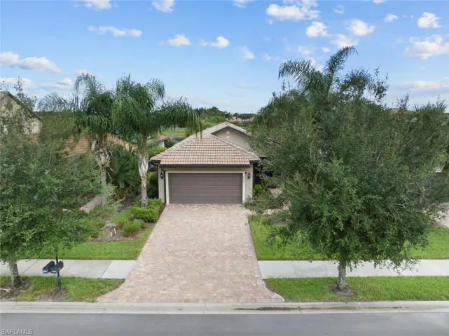Obstructed view of property featuring a garage