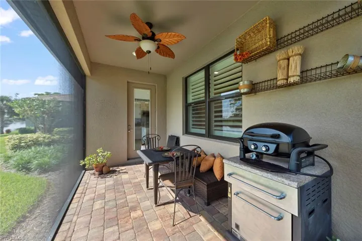 View of patio with ceiling fan