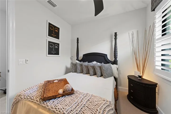 Bedroom with carpet floors and ceiling fan