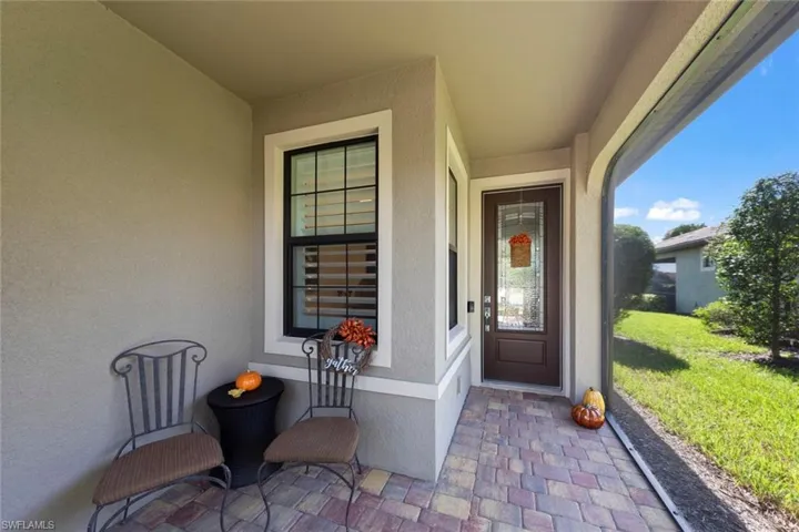 Property entrance featuring a lawn