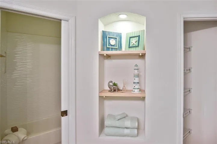 Bathroom with shower / bathing tub combination