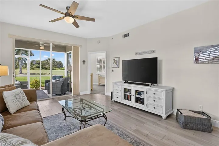 Light-toned plank flooring throughout the main living area