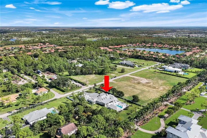 View of property location with nearby suburban area and a large body of water
